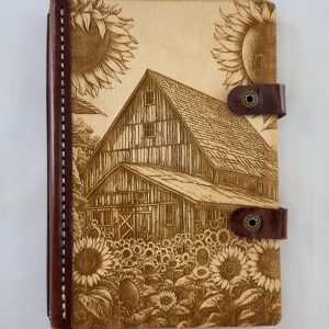 Echoes of the Homestead engraved wood notebook cover