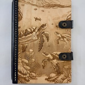 The Coral Passage engraved wooden notebook cover
