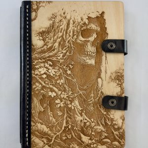 The Withering Watcher engraved wood notebook cover