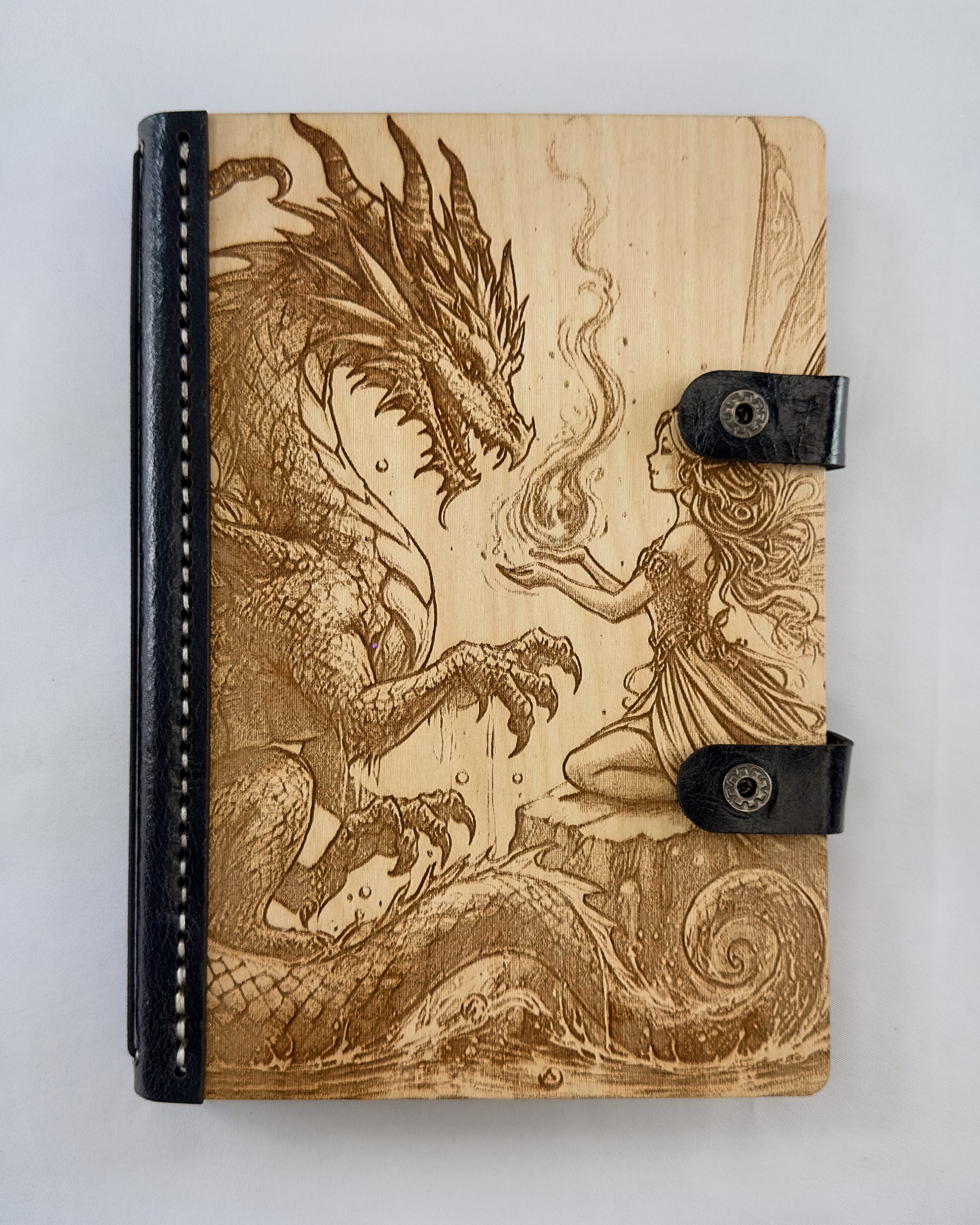 The Pact of Ember and Wing The Pact of Ember and Wing engraved wooden notebook cover